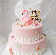 Pink custom birthday cake by Sweetland in Winter Garden