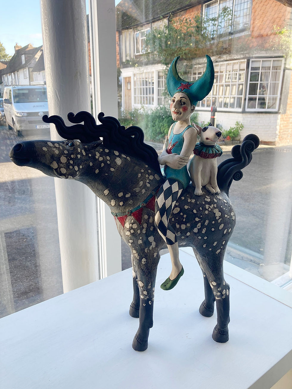 Acrobat on Spotty Grey Horse with Dog