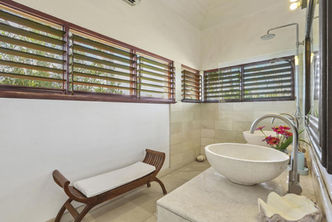 Ensuite bathroom in a luxury Vanuatu villa, showcasing high-end design
