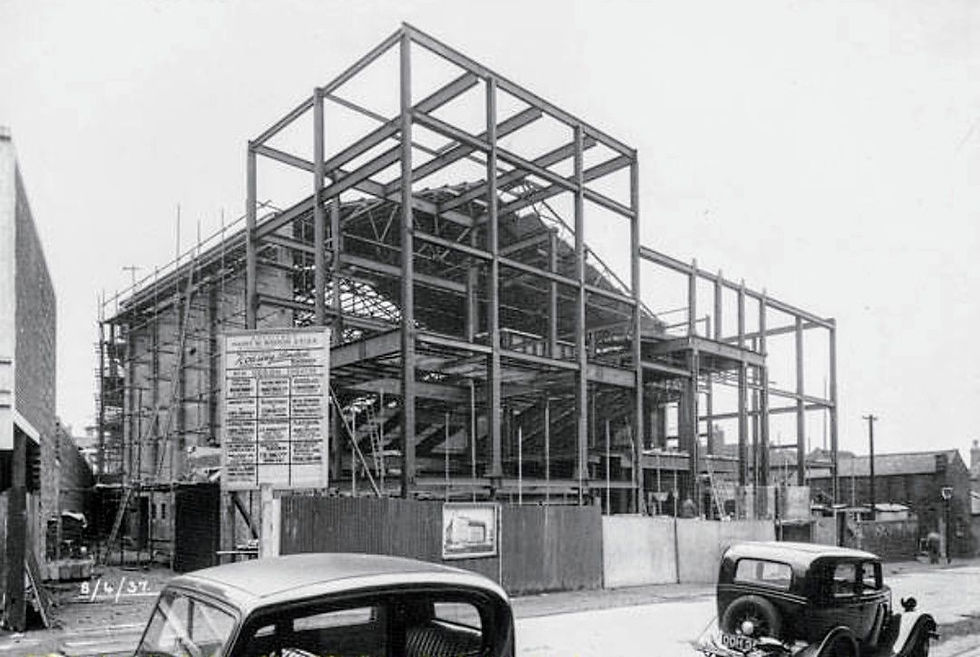 Historic steel frame building under construction
