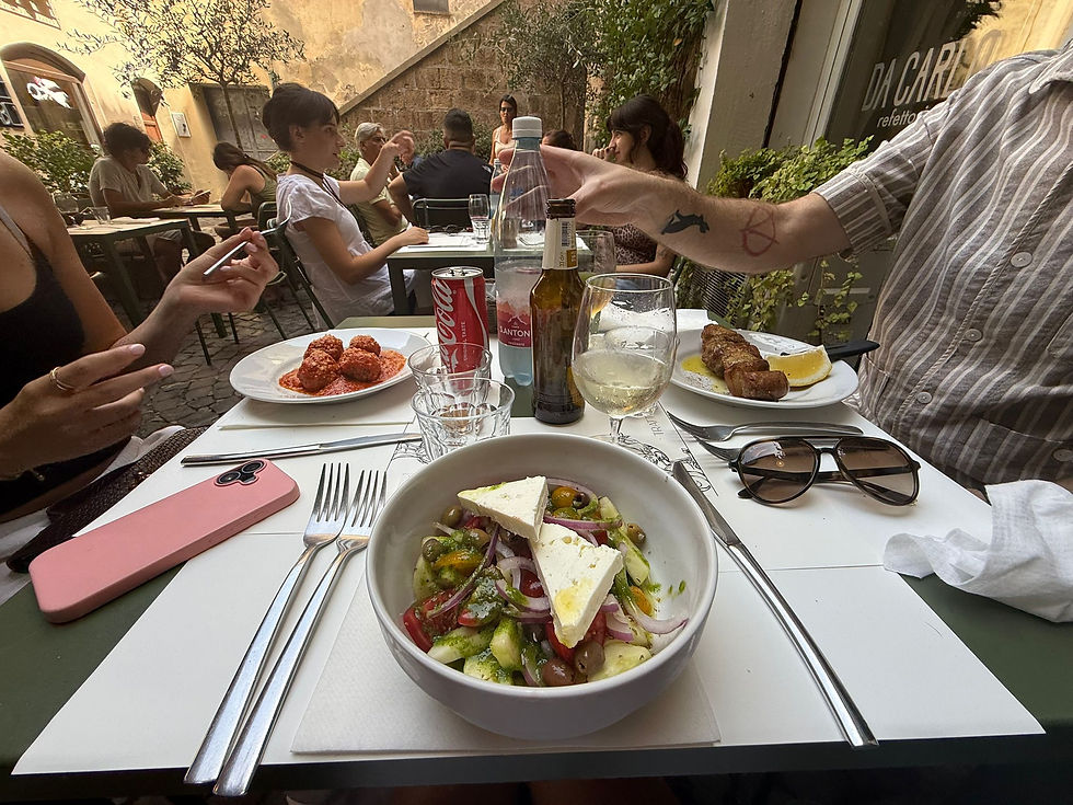 Massive chunks of feta cheese, more Greek than Italian, as per a lot of Italian history. I think Cami's meatballs and Al's veal were a lot more Tuscan.