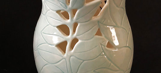Tropical Leaves Vase 8.5 X 4 $80 Carved and pierced leaves.jpg