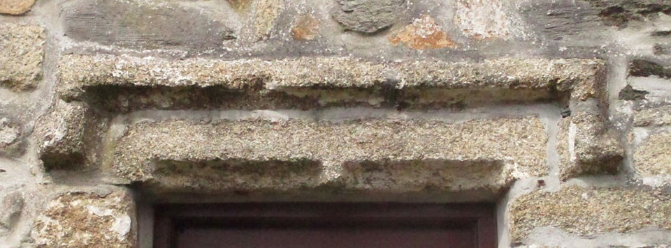 Window frame now above a door.