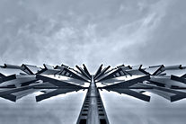 Photographs capturing the World Trade Center's silhouette, symbolizing enduring strength and resilience in NYC.