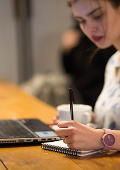 Girl Working in a Cafe