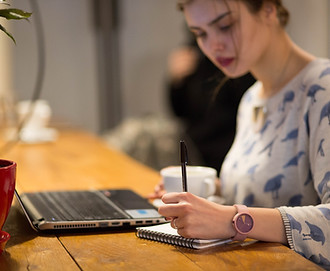 Girl Working in a Cafe
