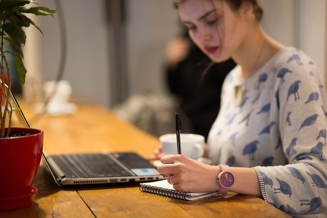 Girl Working in a Cafe