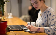 Girl Working in a Cafe