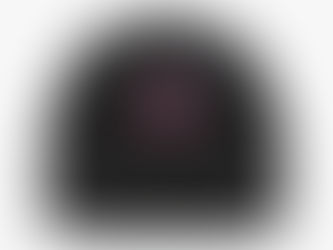 A classic baseball cap adorned with a sparkling rhinestone patch.