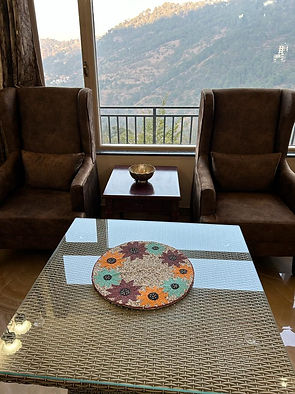 Comfortable sofa seater with beautiful view at SUNS Cottage