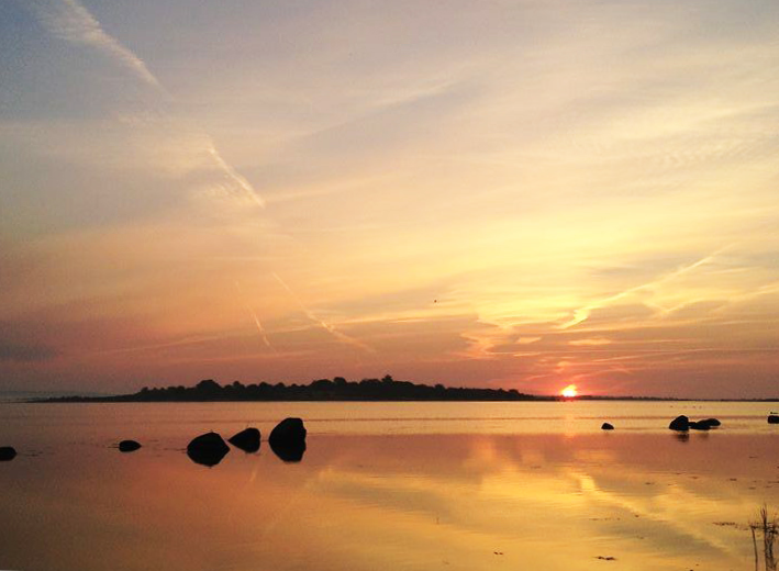 Soluppgång över havet vid Landöns Camping i Skåne
