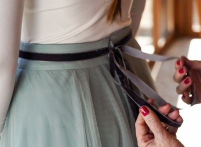 fashion-designer-using-measuring-tape-mannequin.jpg