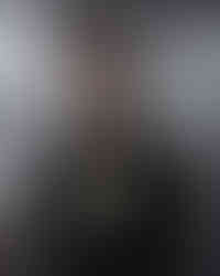 Morbido black unisex sweatshirt with front design of a cartoon wearing shades and text, "chilling"