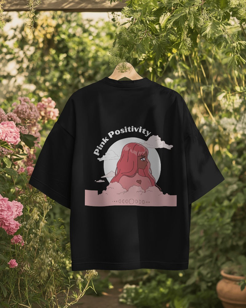 Black women's oversized T-shirt with back print of a women in pink color