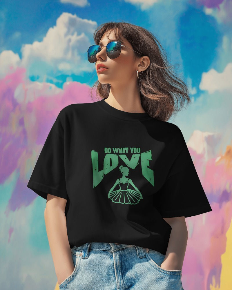 Women's oversize T-shirt with front print of a dancing girl with text, "do what you love"