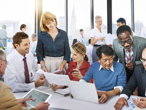 Diverse nonprofit team collaborating during a strategic planning session – PhoenixFire Strategic Consulting.