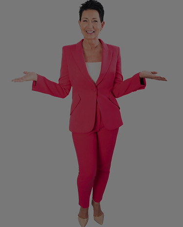 Christi Gates, Keynote Speaker, with her hands outward while smiling at the camera