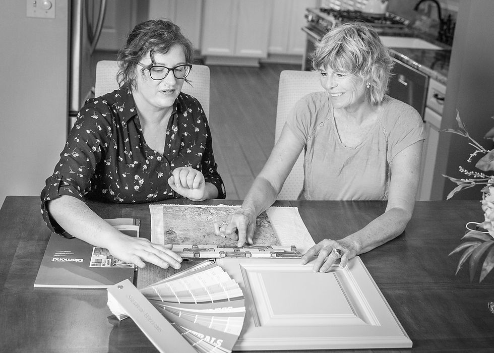 Owner Kristen Books of Harmony Group Design-Build with an interior design Carlisle, PA client in her home