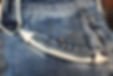 close up of pocket details on a pair of women's jeans