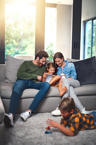 Clients of Daflure Heating and Cooling enjoying some family time after Daflure installed their new heat pump