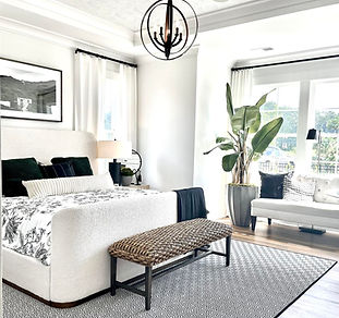 Hotel Room that was designed by EJ Designs Interior Design with a black and white theme