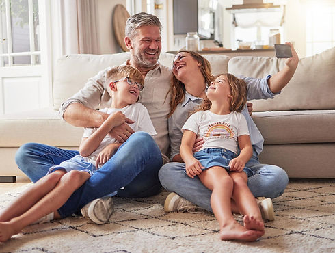 Happy family in Hummelstown, PA enjoying their new heating system installation from Daflure Heating and Cooling