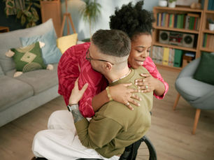 Danell and a home care client hugging in their home after Danell sold her business in Harrisburg, PA with Transworld Business Advisors Capital Reg