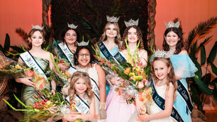 2025 Miss Carlisle Ice Queen Court on Competition Night in their gowns, with their crowns, and with their flowers