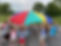 Students at Mountainside Preschool in their Pre-Kindergarten Program playing with a giant colorful sheet in the parking lot