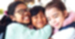 children in the transitions program hugging on Hummel Avenue in Harrisburg PA