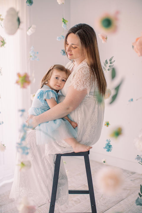 A beautiful mother's day photo session mini featuring handing florals and a mother holding her child at Jessica Snider Photography in Mechanicsburg, PA