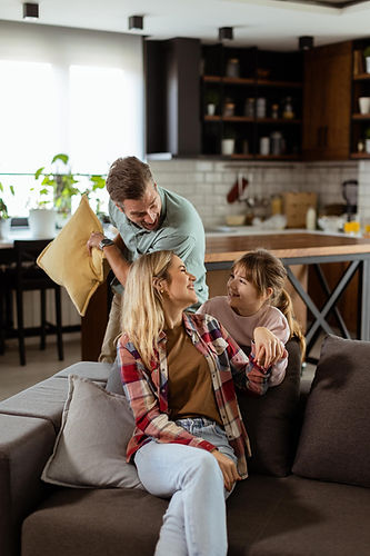 Dillsburg, PA family playing in their living room after Daflure Heating and Cooling came to repair their broken furnace