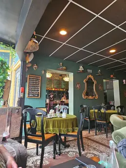 Inside Madame Rochéle's Apothecary, a high-end cocktail bar in Harrisburg, PA with botanical apothecary vibes