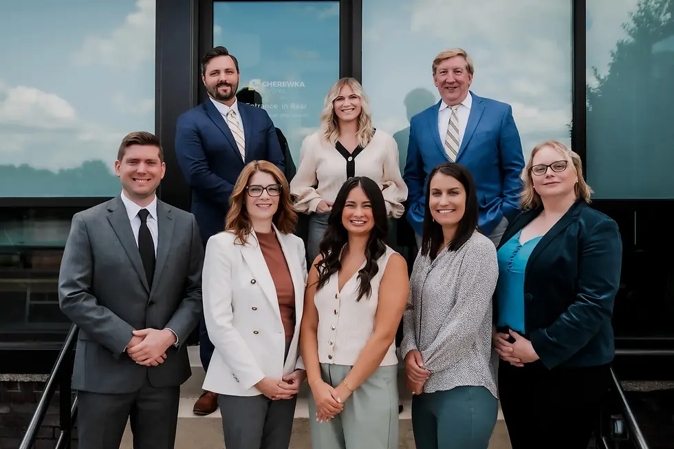 The team at Paramount Settlements in front of the title services company in Wormleysburg, PA