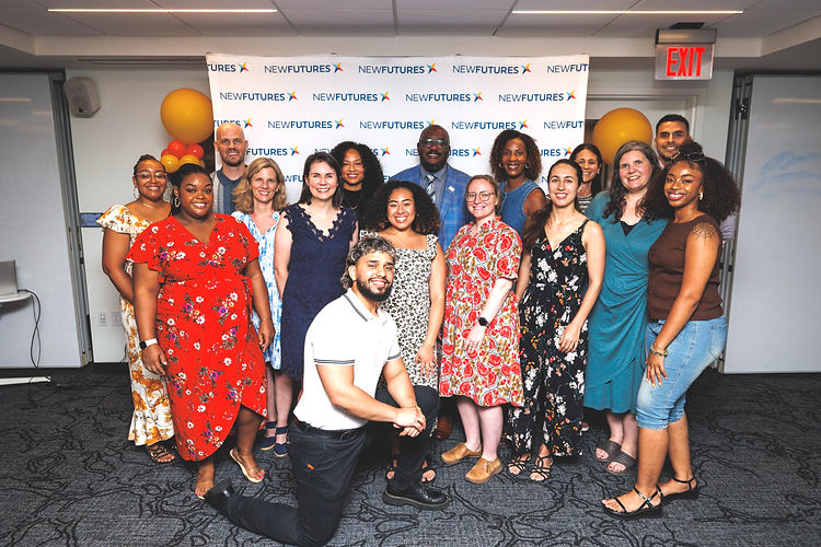 Staff from New Futures during a college scholarship graduation ceremony for their Scholars in DC