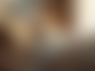 Cozy bedroom with layered lighting and inviting bedding