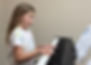 One of our students playing piano in a lesson. She is learning how to sight read music and doing a wonderful job.
