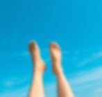 Person's feet in the air