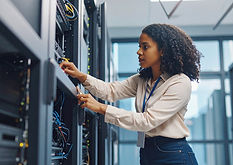 Firefly_create a photorealistic image of a young worker fixed a computer server 516794.jpg