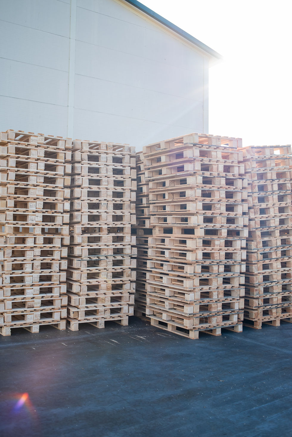 stacked-pallets-warehouse-wood-industry.jpg