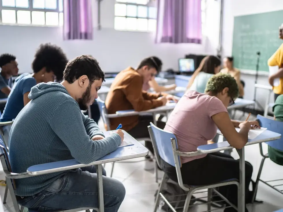 Close-up view of a classroom with students engaged in a discussion