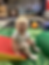 Smiling toddler on play mat in daycare