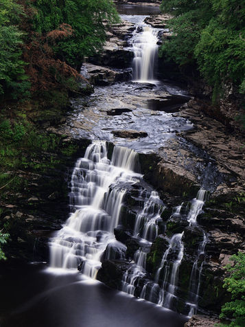 New Lanark falls of clyde waterfall long exposure smooth water summer water