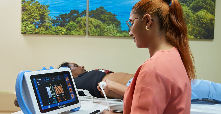 Technician using the Fibroscan equipment in our FibroscanTT offices at 52 Luis Street, Port of Spain, Trinidad and Tobago