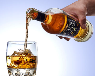 Rum pouring over ice, Angostura Black Label Rum , D'Rum campaign - Lonsdale Saatchi & Saatchi , © Michele Jorsling Drinks Photography 