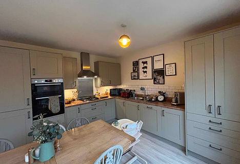 An organised beautiful new build kitchen.