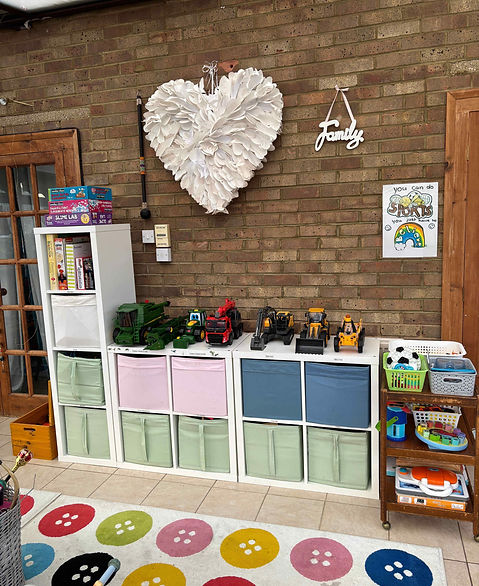 An organised playroom with IKEA Kallax storage.