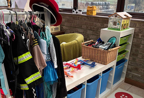 Dressing up area in a playroom.