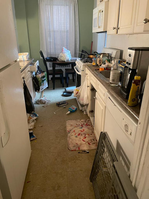 Messy kitchen needing cleaning