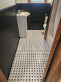 Clean black and white bathroom floor tiles